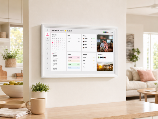 Whale Framely smart family calendar display mounted on kitchen wall with calendar tasks weather and meal plan dashboard